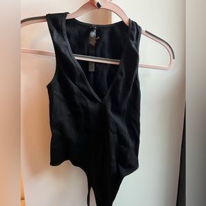 Urban Outfitters V-Neck thong body suit - never worn Size L